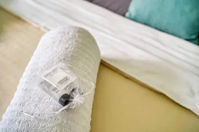 a bandaged leg of a bed with a bandaged at Le Marignan in Cannes