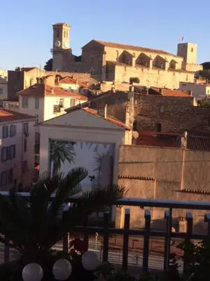 a view of a city with buildings in the background at Lou Suquetan in Cannes