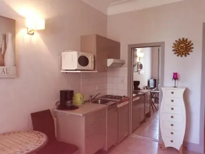 a kitchen with a sink and a microwave at Studio Cannes Croisette in Cannes