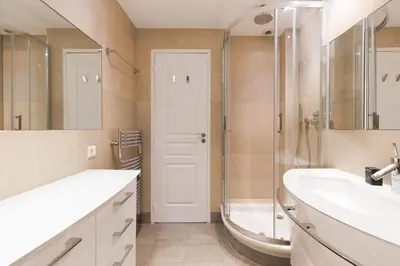a bathroom with a tub and a sink and a shower at Mer du Sud 4 YourHostHelper in Cannes