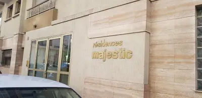 a sign on the side of a building at Branly by Welcome to Cannes in Cannes
