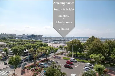 a view of a parking lot in a city at Top floor2 beds w/sea wiew in Cannes