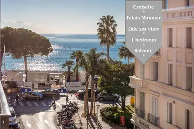a view of the ocean from a building at Palais Miramar: 1 bed side sea view in Cannes