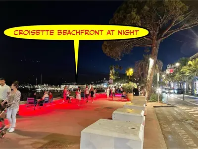 a sign that readsgatehibited backront at night on a street at New - cosy & nice Apartment in Palais Miramar in Cannes