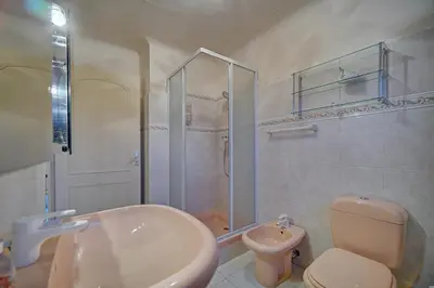 a bathroom with a sink and a toilet and a shower at Superbe Duplex TERRASSE vue MER, FELIX FAURE- FORVILLE A1B059 in Cannes