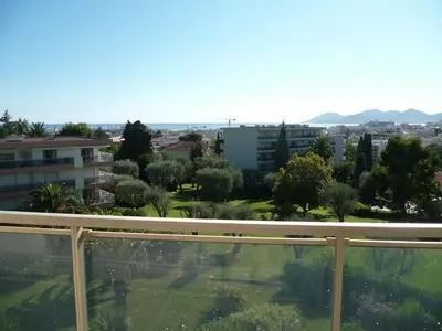 a view of a city from a balcony at Karolina Properties - Ascot Appartement in Cannes