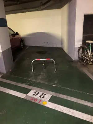 a parking lot with a bike rack in a parking garage at Cannes apartment with sea view, aircondition and parking in Cannes