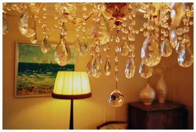 a bunch of glass bubbles hanging from a chandelier at Appartement Claire Deluxe in Cannes