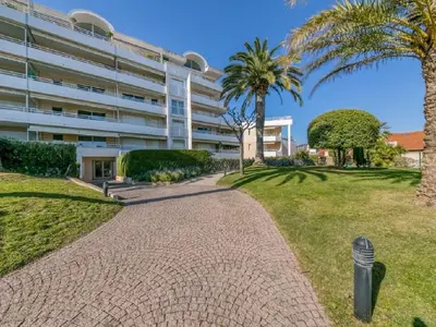 a walkway in front of a building at Apartment Riviera Park-1 by Interhome in Cannes