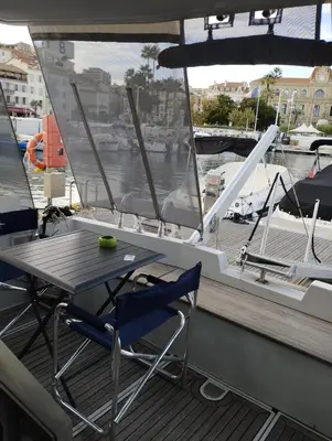 a table and chairs on the deck of a boat at Ferretti 36 ' Bateau à Quai Vieux-Port Cannes Festival La Croisette in Cannes