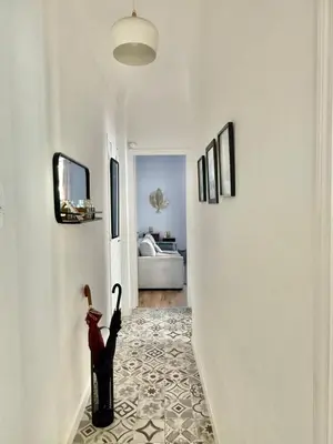a hallway with a room with a room with a bedroom at Le Salvator in Cannes