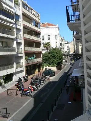 a group of motorcycles parked next to a building at Frères Pradignac in Cannes