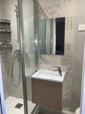 a bathroom with a sink and a shower at Studio Vagliano in Cannes