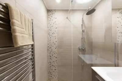 a bathroom with a shower and a sink at 2-Br apartment 2 minutes from the beach parking in Cannes