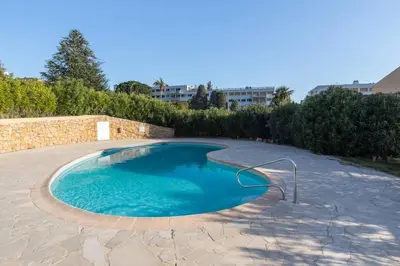 a small swimming pool in a patio at Haven of Peace 1-Br Terrace with Sea View & Pool in Cannes