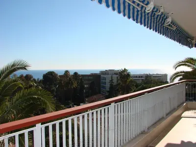 a balcony with a view of the ocean at The Best Place in Cannes