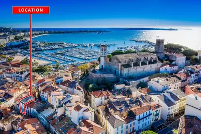 an aerial view of a city with a castle at Joli appartement à côté du Palais des Festivals in Cannes