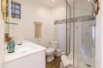 a bathroom with a shower and a sink and a toilet at Joli appartement à côté du Palais des Festivals in Cannes