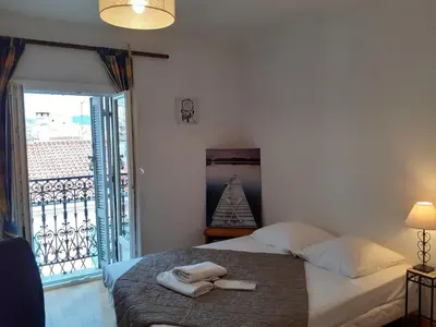 a bedroom with a bed with two towels on it at Stella Apartment - Cannes in Cannes