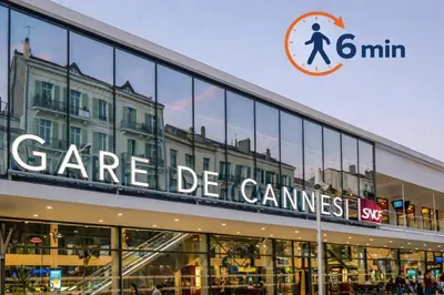 a building with a sign that reads care de commerce at Cannes NEW Apartment, Palais Des Festivals, CROISETTE, Beaches in Cannes