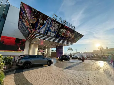 a car parked in front of a versace store at Prime Location Hyper Center Ideal for Couples & Families - Walk Everywhere -By Totolulucannes in Cannes