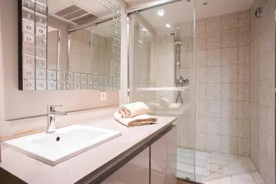 a bathroom with a sink and a shower at 24 Août Sucquet in Cannes