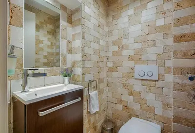 a bathroom with a sink and a toilet at RG Duplex - Sea View - Palais & Croisette - Luxury Stay by LRA Cannes in Cannes