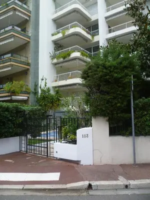 an apartment building with the number in front of it at Karolina Properties - Appartement Commodore Croisette in Cannes