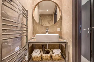 a bathroom with a sink and a mirror at Residence Provencal - Luxurious - 300m Palais - LRA CANNES in Cannes