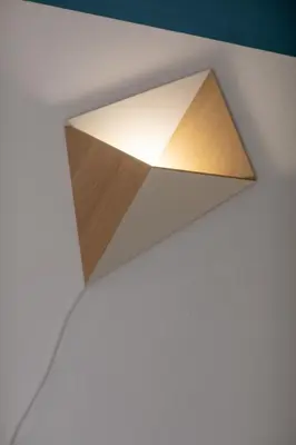 a wooden triangle on the ceiling of a room at Belle surprise cœur de ville, cosy avec terrasse in Cannes