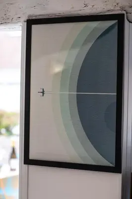 a window with a picture of a planet at Belle surprise cœur de ville, cosy avec terrasse in Cannes