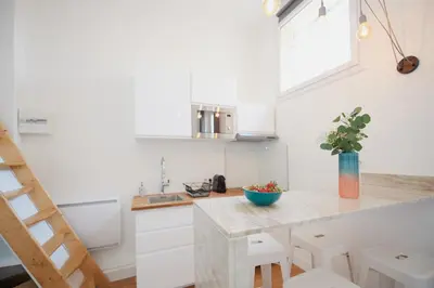 a kitchen with a counter with a blue bowl on it at 6 Rue Coste Corail in Cannes