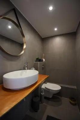 a bathroom with a white sink and a toilet at 6 Rue Coste Corail in Cannes