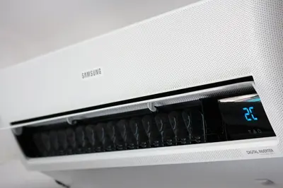 a close up of a microwave oven with a clock at Grand Studio Cannes Centre in Cannes