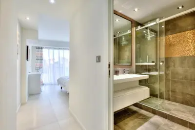a bathroom with a sink and a shower at REF 1147 - Cannes Center - Apartment for rent in Cannes