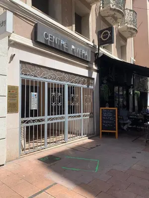 a store front with a gate in a building at Centre Riviera 2P LHO5516 in Cannes
