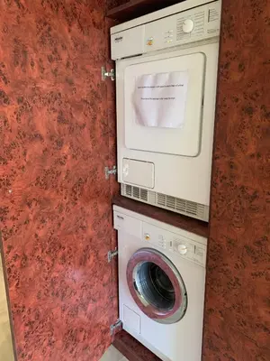 a washer and a washing machine in a room at Gray d'Albion POL519 studio in Cannes