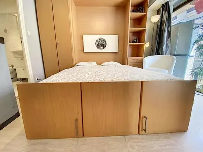 a bedroom with a bed in a room at Imperial Croisette FER3417 studio in Cannes