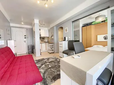 a room with a bed and a table and chairs at Imperial Croisette FER3417 studio in Cannes