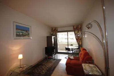 a living room with a couch and a table at Gray d'Albion VIM1163 studio in Cannes