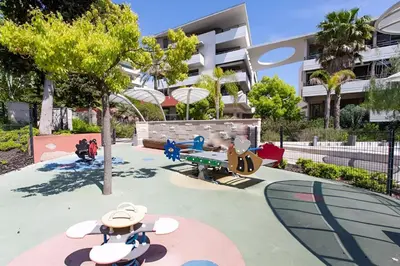 a playground in front of a building at Montfleurie TEI142 3P in Cannes
