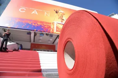 a large roll of red carpet in front of a building at Centre ville 10 min de la Croisette/Downtown in Cannes