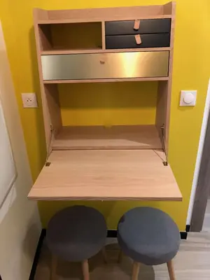 a shelf with two stools in a room at Scandinavian Urban 2 - 2BR apartment in center close to Palais des Festivals and the beach in Cannes