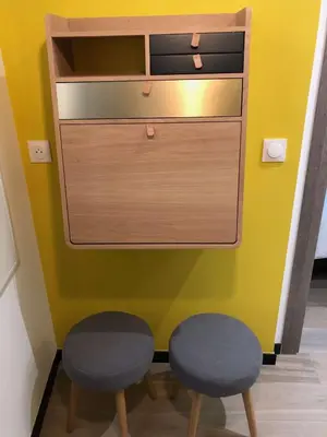 two stools in front of a dresser in a room at Scandinavian Urban 2 - 2BR apartment in center close to Palais des Festivals and the beach in Cannes