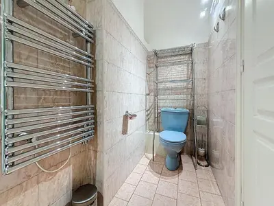 a bathroom with a blue toilet in a room at Luxury 1 bedroom Croisette Martinez direct sea view 241 in Cannes