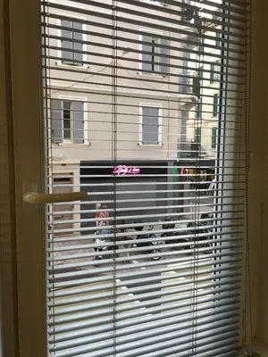 a window with a view of a building at STUDIO 45 CROISETTE CANNES in Cannes