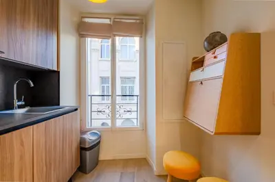 a kitchen with a sink and a window at Scandinavian Urban 3 - 2BR apartment in Cannes center - close to the beach and Palais in Cannes