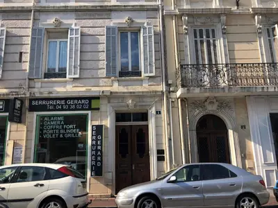 two cars parked in front of a building at Lecerf 2P CUR1095 in Cannes