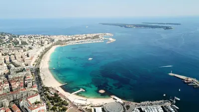 an aerial view of a beach and the ocean at Ideal Sejour Cannes - Hôtel de Charme in Cannes