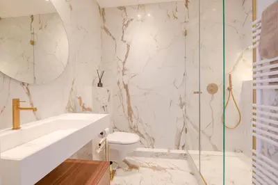a bathroom with a sink and a toilet and a shower at La Guitare 24 - Nice studio in center of Cannes, just behind Grand Hotel in Cannes